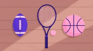Fußball, Basketball und weitere Sportgeräte auf einem Holztisch